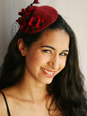 Red_fascinator_headshot_smiling_small_thumb